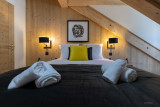 2-pieces-cabine-4-6-personnes-detail-chambre-le-cristal-lodge-serre-chevalier