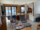 salon-cote-poele-a-granules-chalet-le-mont-milo-serre-chevalier-vallee-briancon